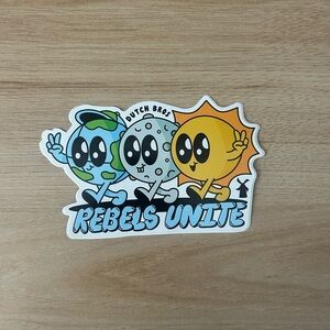 Dutch Bros Cartoon Sticker with Blue, Green, and Orange